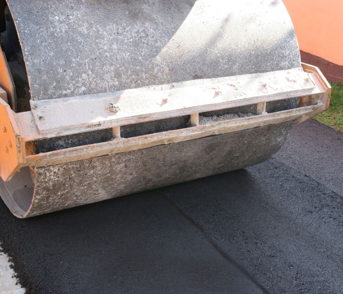 asphalt driveway paving with roller